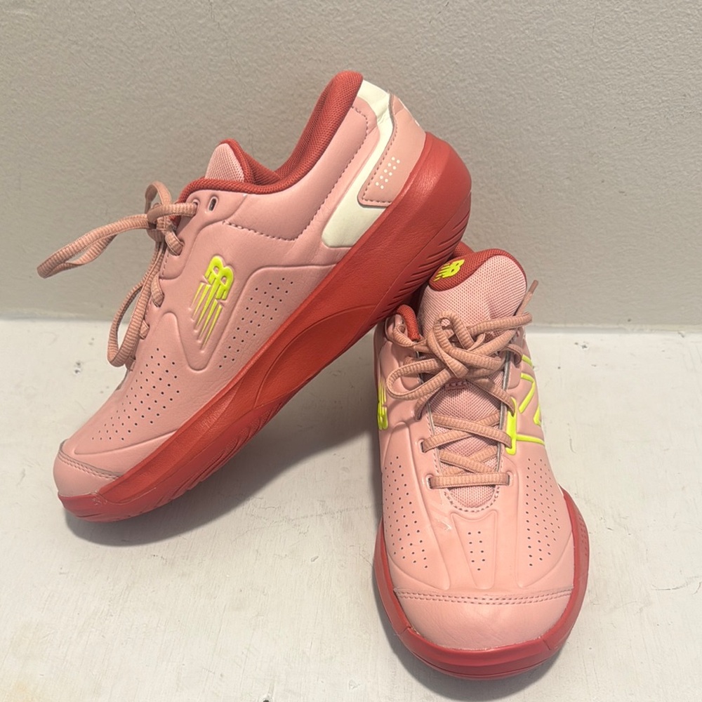 New Balance Pink and Red Athletic Shoes with Modern Silhouette